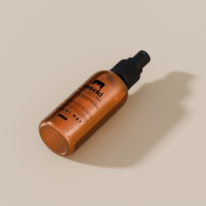Angled Amber Glass Spray Bottle Mockup (Lying Down)