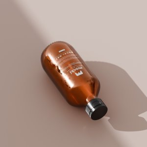 Lying Amber Glass Bottle Mockup