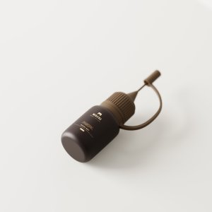 Laid Down Small Needle Tip Bottle Mockup